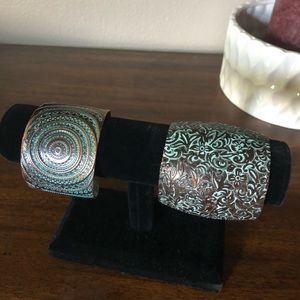 2 thick bangle bracelets